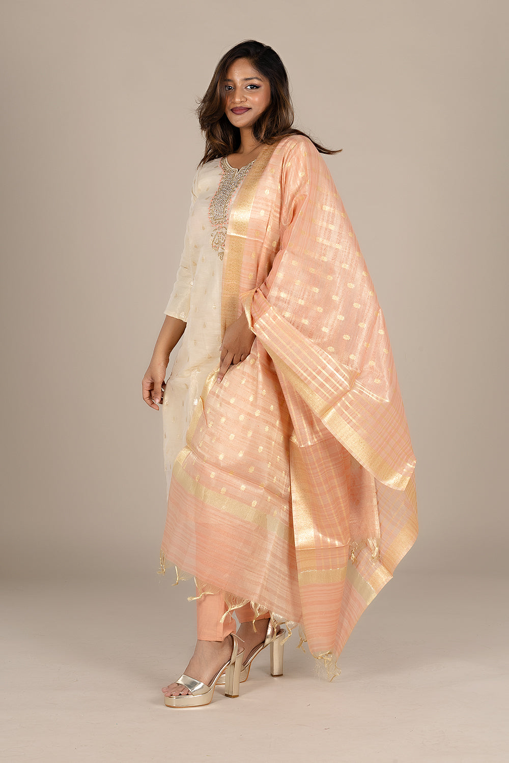 Off-White Designer Suit with Powdered Orange Dupatta