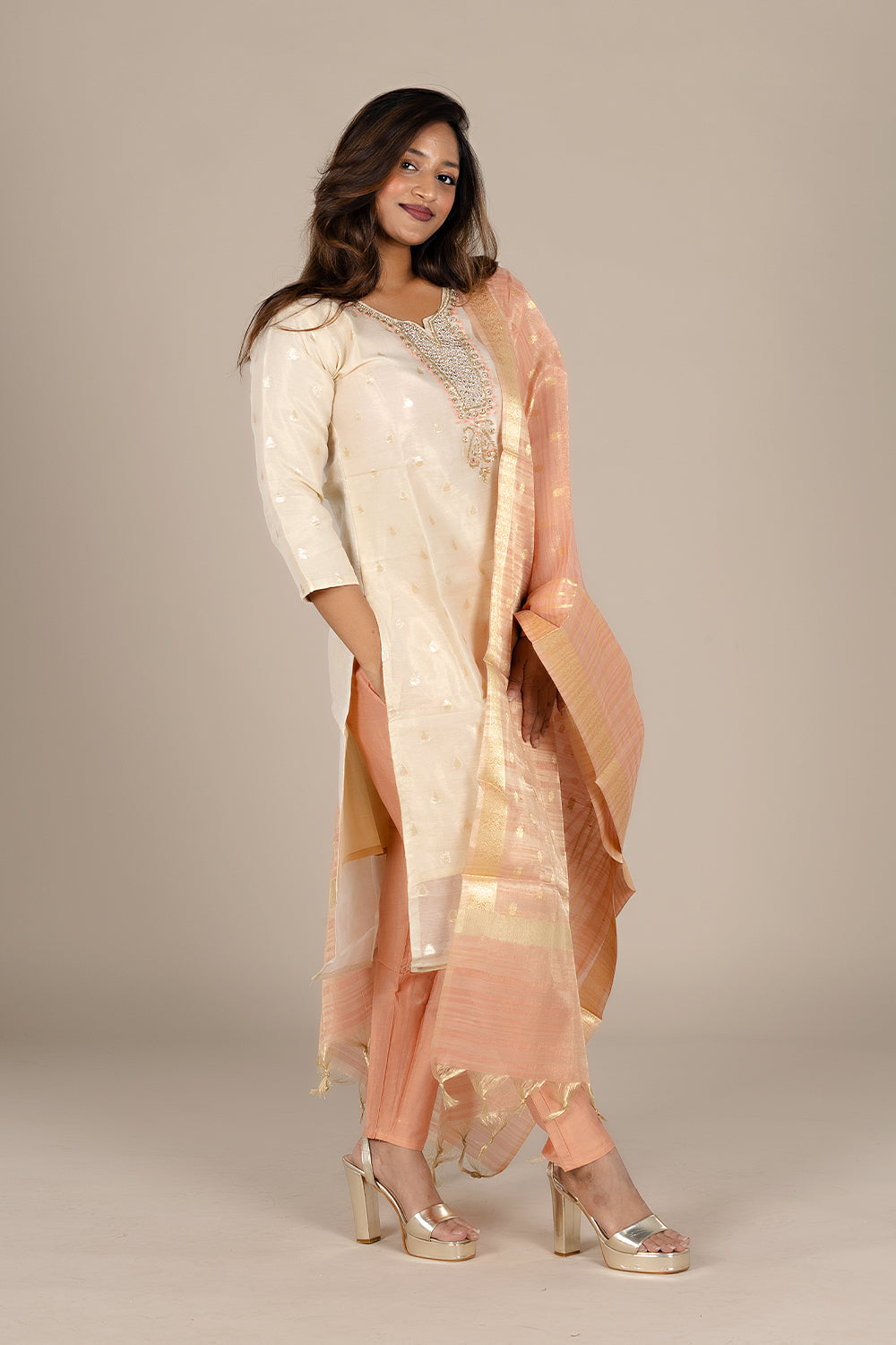 Off-White Designer Suit with Powdered Orange Dupatta