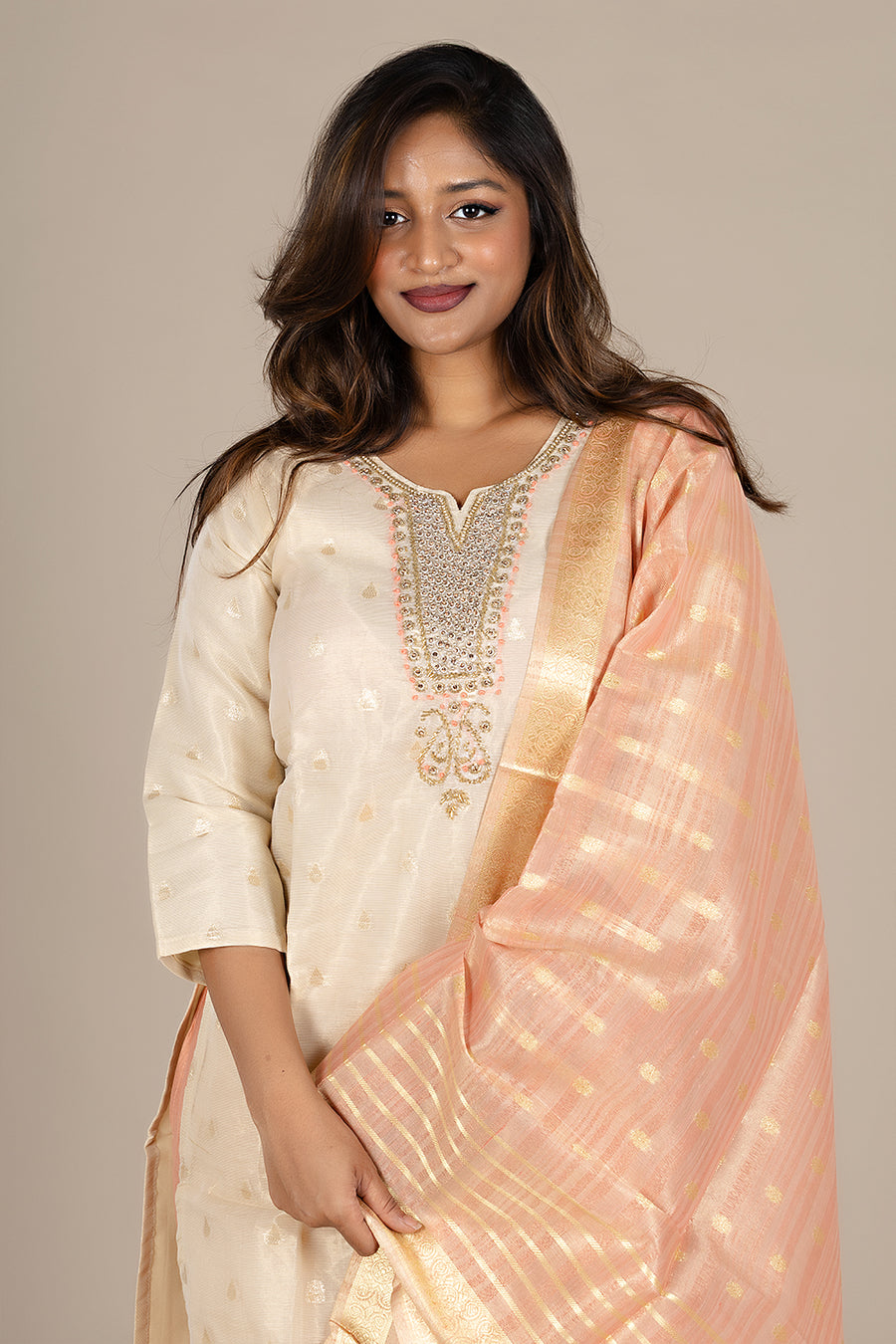 Off-White Designer Suit with Powdered Orange Dupatta