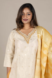 Off-White Silk Suit with Colored Organza Dupatta